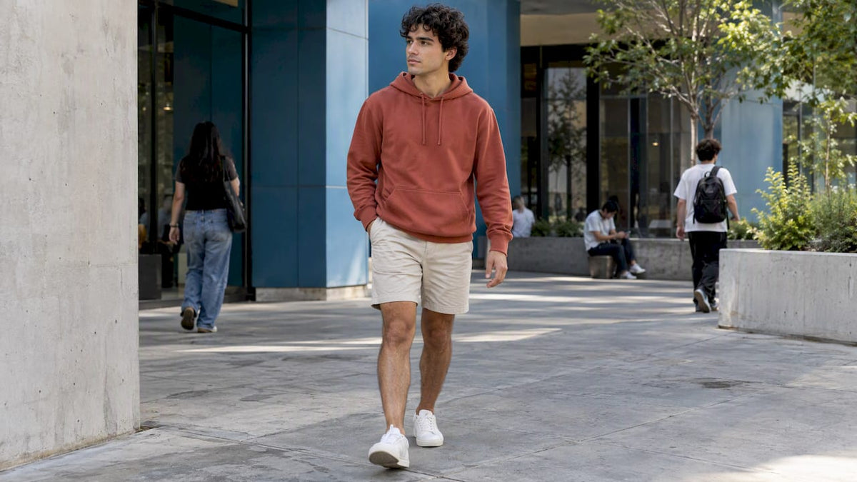 Young adult wearing a summer hoodie outfit